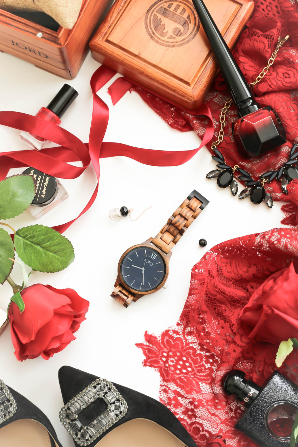 JORD Frankie Series Zebrawood & Navy Wooden Watch styled with red lace scarf, black shoes and beauty items 