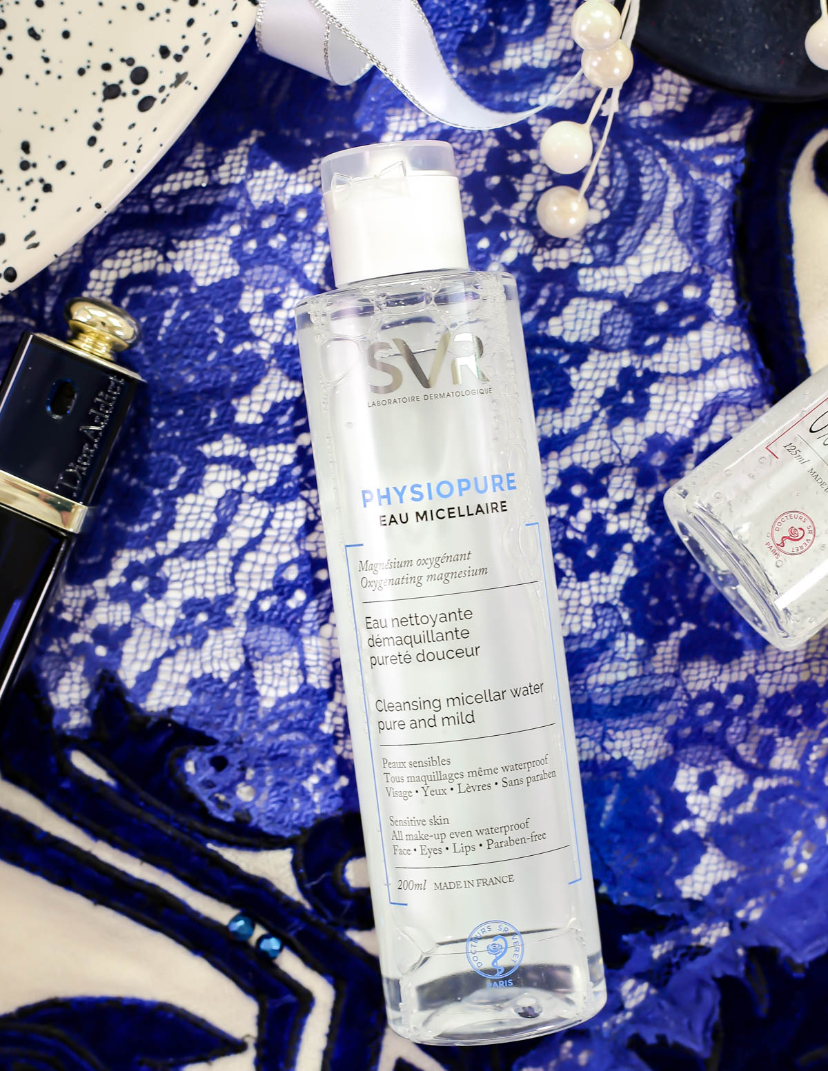 SVR Laboratoires | The French Pharmacy Brand For Every Skincare Need feat SVR Physiopure Eau Micellaire in with blue scarf styling