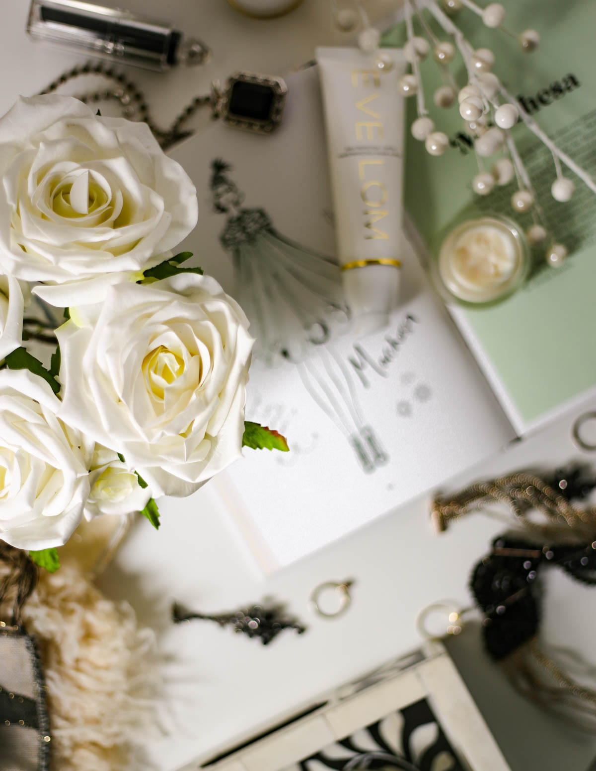 Blog Photography | 3 Ways to Be More Creative With Your Photos | feat flatlay with roses in focus